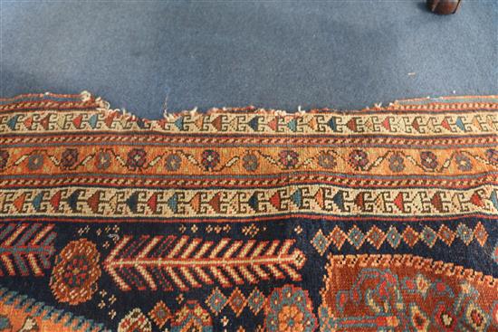 Two red and blue ground rugs, 120 x 90cm & 120 x 100cm